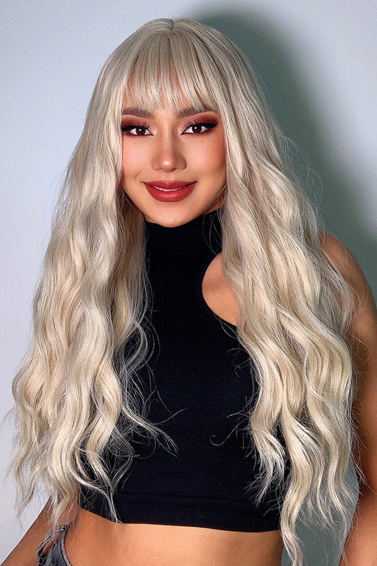 Peruca blonda cu par lung, usor ondulat si breton PER106-9999